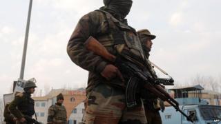 A Kashmiri soldier with a Kalashnikov