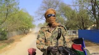 A South Sudan army soldier mans a machine gun - 30 December 2013