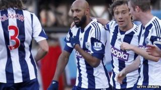 West Bromwich Albion's Nicolas Anelka performs a "quenelle" after scoring a goal on December 28, 2013.