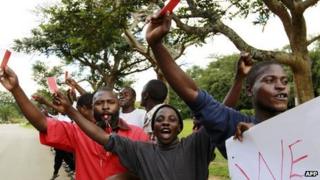 Frank Bwalya (C in red) and supporters at a protest in Lusaka, Zambia, on 22 March 2011