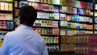 A man at an independent drug store in Hong Kong