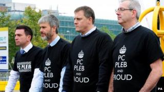 Police Fed reps wearing PC Pleb t-shirts
