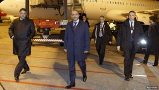 Leader of Syria"s opposition National Coalition arrive for the Geneva II talks on Syria