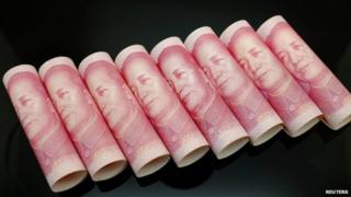Chinese 100 Yuan banknotes seen in this illustration picture in Beijing November 5, 2013