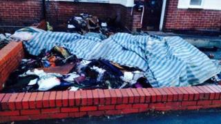 Storm damage in front garden of house