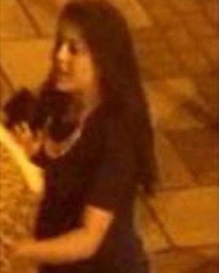 CCTV image of woman