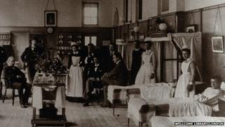 Baron Lister (seated) with his staff on Victoria ward, King's College Hospital in 1893.