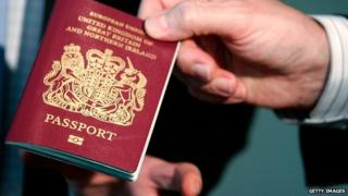 Man holds passport