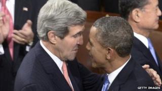 President Barack Obama and Secretary of State John Kerry talk before the State of the Union address on January 28, 2014.