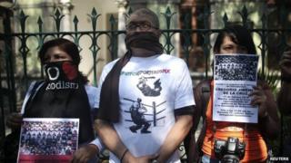 Journalists hold posters as they protest against the kidnapping of Gregorio Jimenez de la Cruz outside the Government of Veracruz building on 11 February, 2014