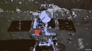 A photograph of the giant screen at the Beijing Aerospace Control Center shows photo of the Yutu, or Jade Rabbit lunar rover, taken by the camera on the Chang'e 3 probe during the mutual-photograph process, in Beijing, 15 December 2013
