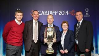Former European club competition winners Ole Gunnar Solskjaer (left) and Kevin Ratcliffe (right) are either side of Welsh government Sports Minister John Griffiths, Jonathan Ford, chief executive of the Football Association of Wales, and Councillor Heather Joyce, leader of Cardiff council