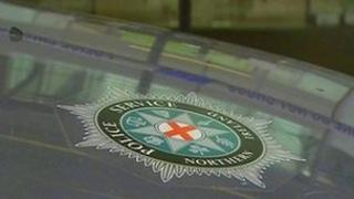 PSNI crest on car bonnet