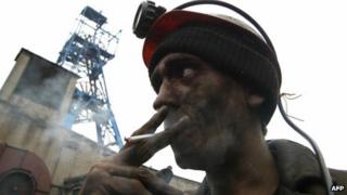 Miner smokes in front of mine in Makiyivka, eastern Ukraine (file image)
