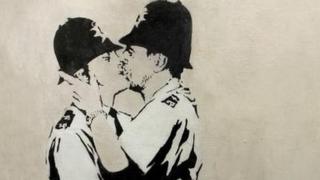 Banksy's Kissing Coppers Sold At US Auction - BBC News