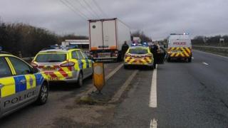 Lorry and police cars on A27
