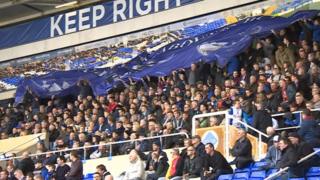 Birmingham City fans unfurl flag in protest against owners  BBC News
