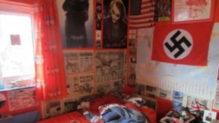 Swastika flag above Michael Piggin's bed