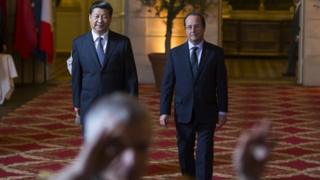 President Xi Jinping (left) held talks with his French counterpart Francois Hollande on Wednesday
