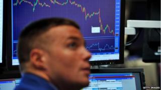 Man looks a stock exchange graph