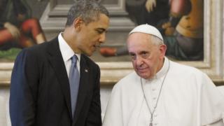 President Obama speaks with Pope Francis during a meeting in Rome on 27 march, 2014.