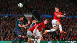 Nemanja Vidic of Manchester United scores against Bayern Munich in the Champions League quarter final