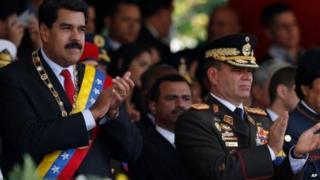 Venezuela's President Nicolas Maduro, left, and Operational Strategic Commander General Vladimir Padrino, right, on March 5, 2014.