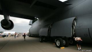 Looking into the wheel well of a plane on the tarmac in Wisconsin in 2007.
