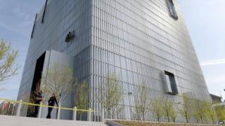 Authorities secure the plaza as police investigate a shooting inside the Federal Courthouse in Salt Lake City 21 April 2014