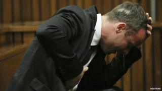 Oscar Pistorius becomes emotional during his trial at the high court in Pretoria on 7 April 2014.