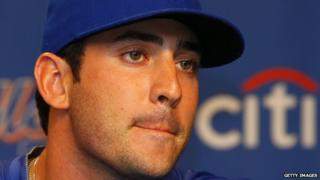 New York Mets pitcher Matt Harvey purses his lips during a press conference in 2013.
