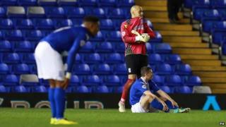 Birmingham City players look frustrated after defeat against Wigan
