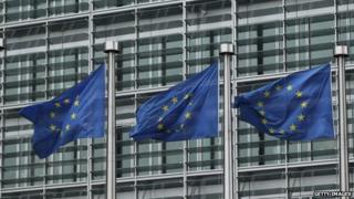 European Union flags outside the EU Commission building in Brussels