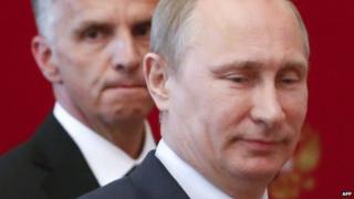 Russia's Putin and Swiss President Didier Burkhalter in Moscow on 7 May 2014