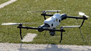 One of several small drones designed for use by law enforcement and first responders is shown at University of North Dakota 14 May 2013
