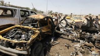 Aftermath of car bomb in Baghdad (13 May 2014)
