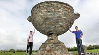 Antony Barrettes' sons Peter and Anthony jnr with the Sam Maguire made from stone