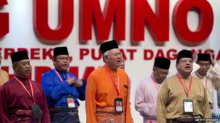 Malaysian Prime Minister Najib Razak with party members at the national assembly in Kuala Lumpur