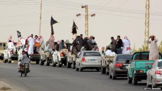 A funeral convoy carrying the bodies of four Egyptian militants in the Sinai peninsula - 10 August 2013