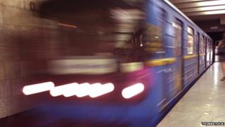 Subway train pulling into station