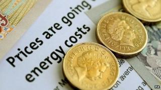 Energy bill and coins