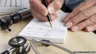 Doctor writing prescription notes