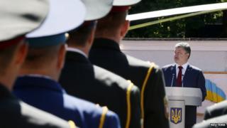 Ukrainian President Petro Poroshenko attends a graduation ceremony at the National University of Defence in Kiev on 18 June