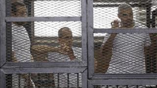 Baher Mohamed, Peter Greste and Mohamed Fahmy in court (1 June 2014)