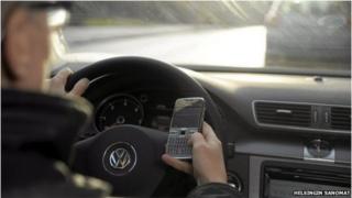 Driver texting at the wheel
