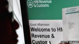 A man views a tax return form