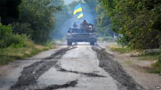 Ukrainian troops patrol 30km (20 miles) from Donetsk, 31 July 2014