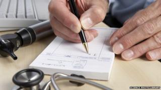 Doctor writing a prescription