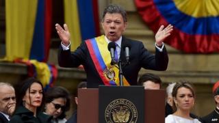 Colombian President Juan Manuel Santos delivers a speech during the inauguration ceremony at the National Congress on 7 August 2014 in Bogota, Colombia