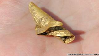 Gold ornament